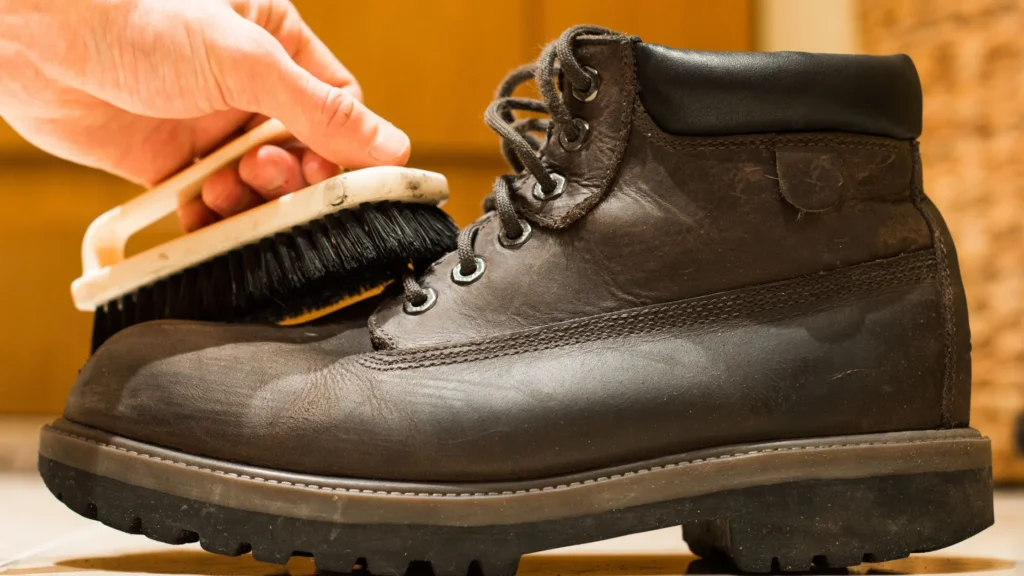 image is about the industrial worker wiping dust from safety hsoe